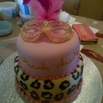 Mask and leopard print cake