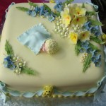 Yellow and blue christening cake